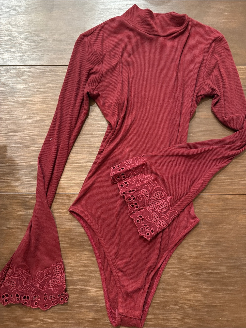 Free People Ribbed Long-Sleeve Bodysuit in Wine